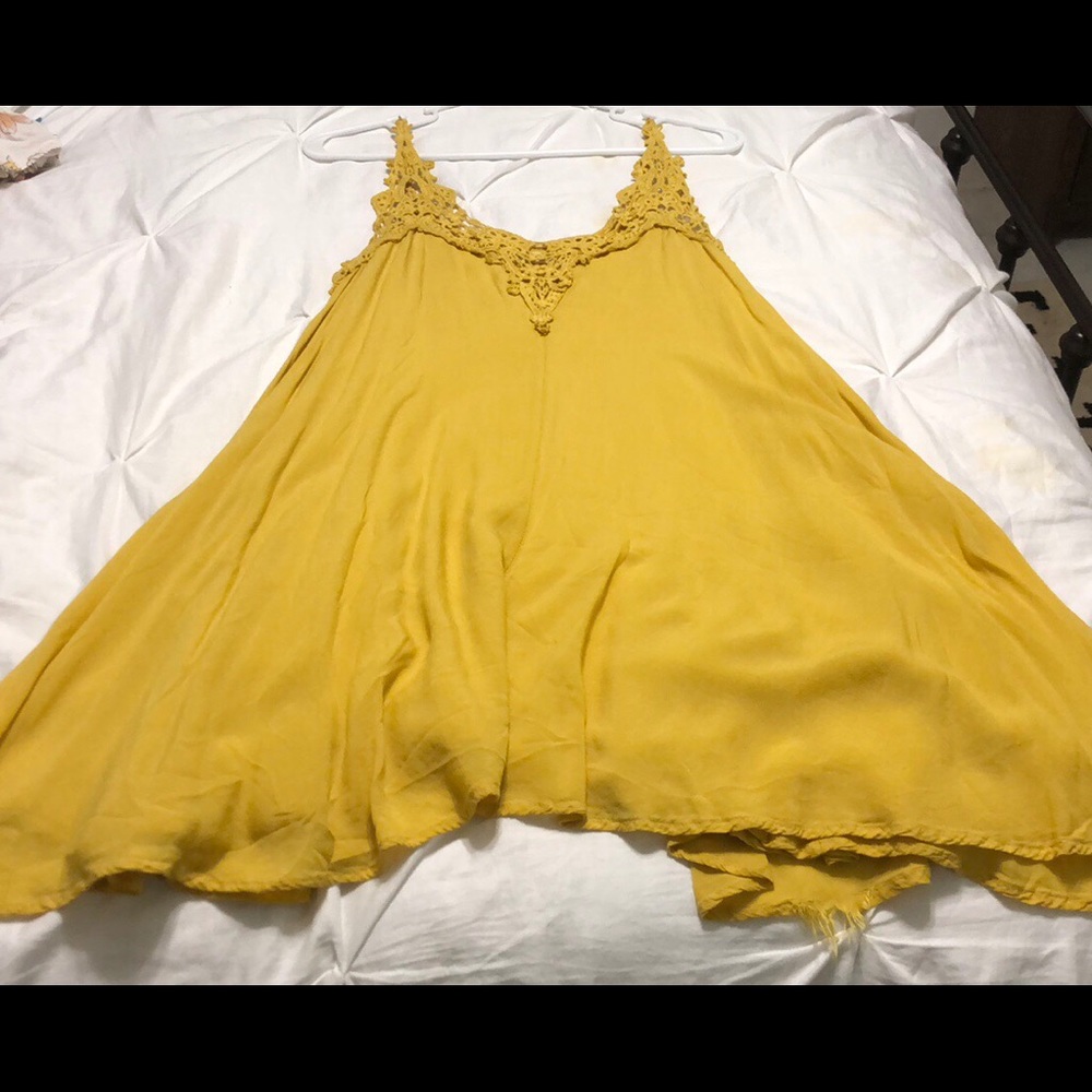 Gold dress with detailed neck line. Worn once